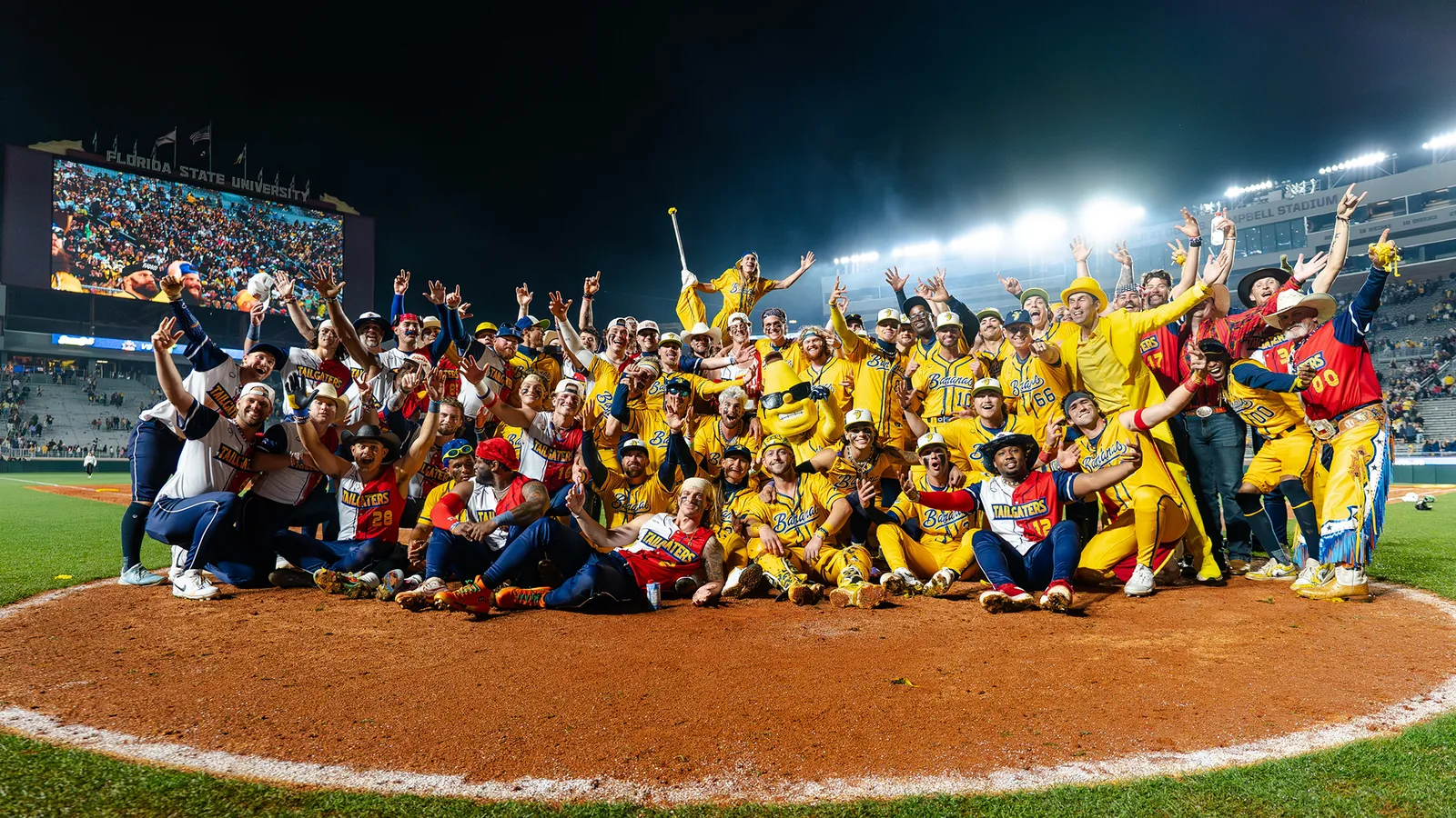 Savannah Bananas and Texas Tailgaters players together at Doak Campbell Stadium