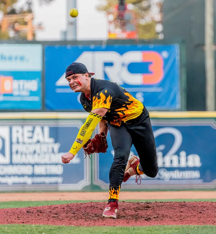 Firefighters pitcher Tyler Rigot delivering a pitch during a Banana Ball game in Richmond